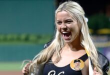 Livvy Dunne cheers on SI models’ first pitch before Paul Skenes takes mound