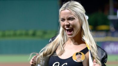 Livvy Dunne cheers on SI models’ first pitch before Paul Skenes takes mound